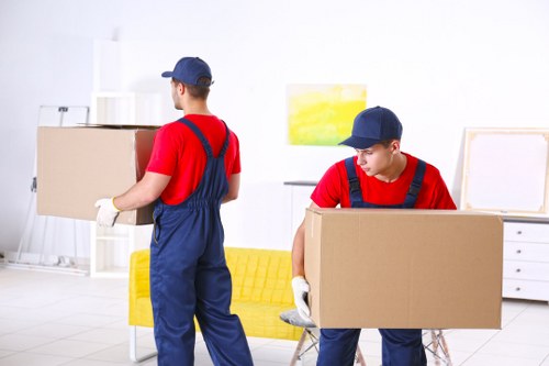 Removal van and moving boxes ready for a home move in Watford