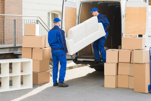Careful wrapping and labelling of household items in Watford