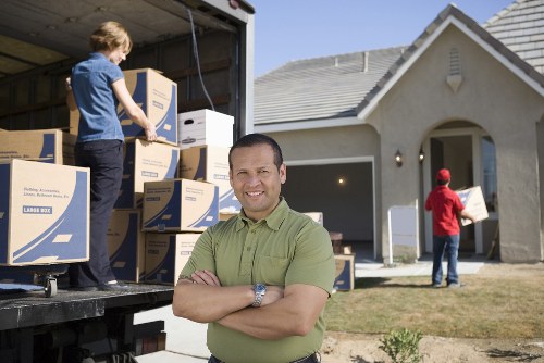 Team member loading items safely into a van