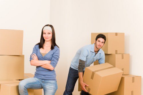 Packed office equipment and furniture prepared for transport