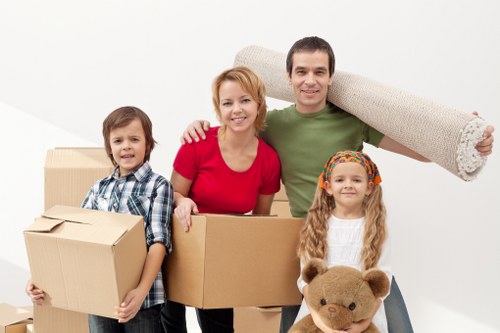 Loading furniture into a removal van for a local Watford move
