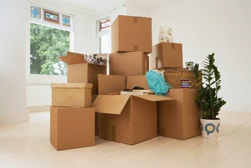 Removal team handling boxes and furniture for a Watford move