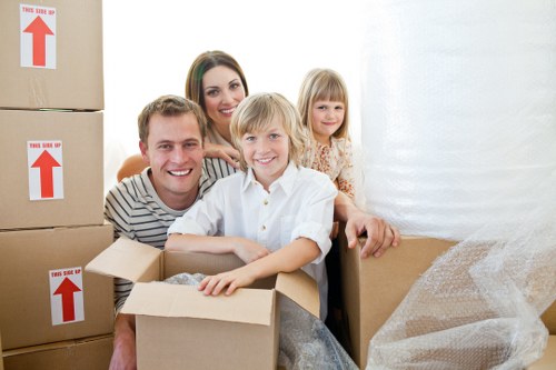Furniture and boxes being moved by a van service in Watford