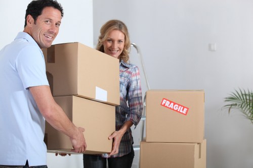 Packed boxes and furniture ready for transport in Watford